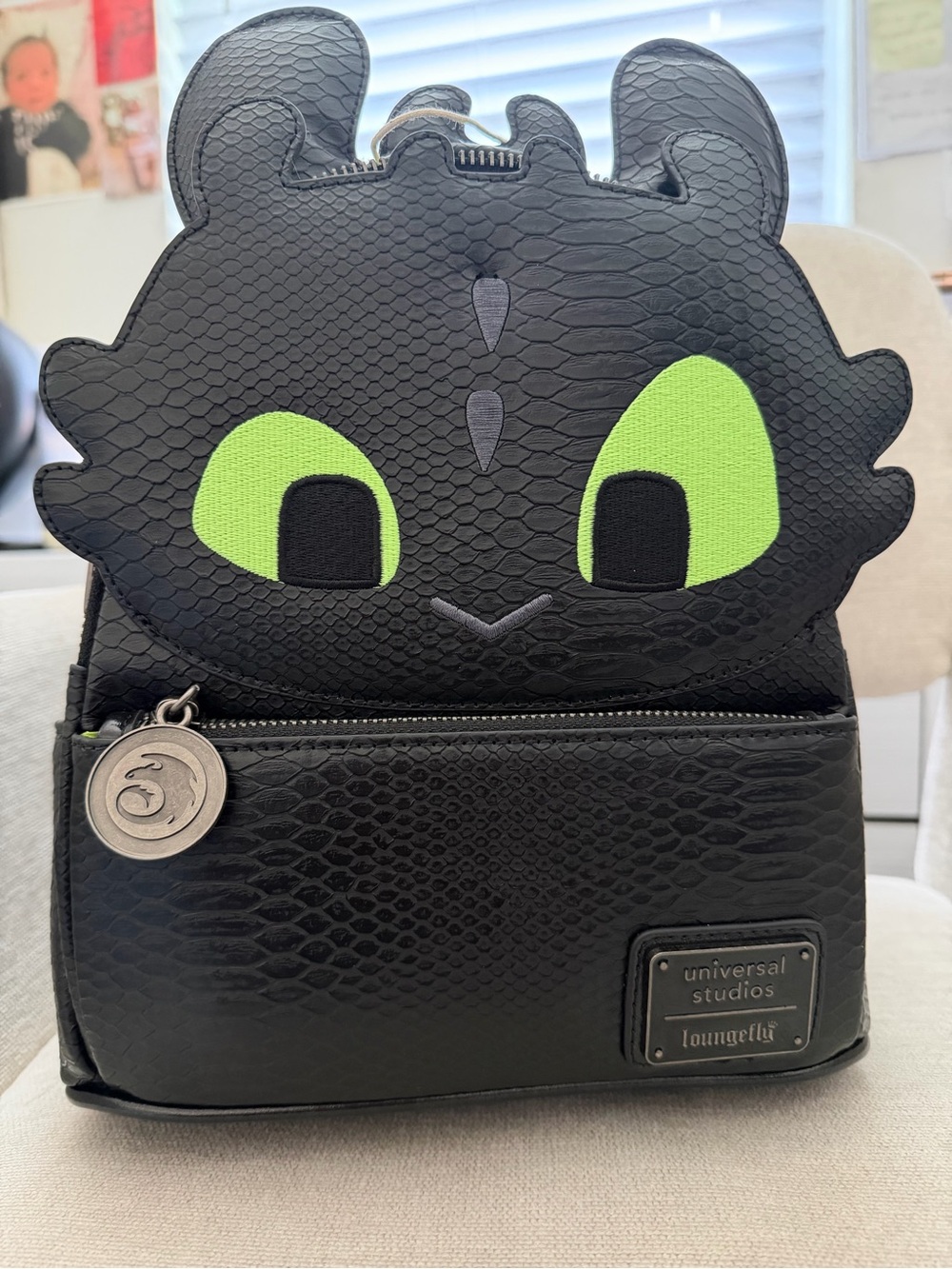 Loungefly Black Dragon Kids Backpack with Neon Green Eyes